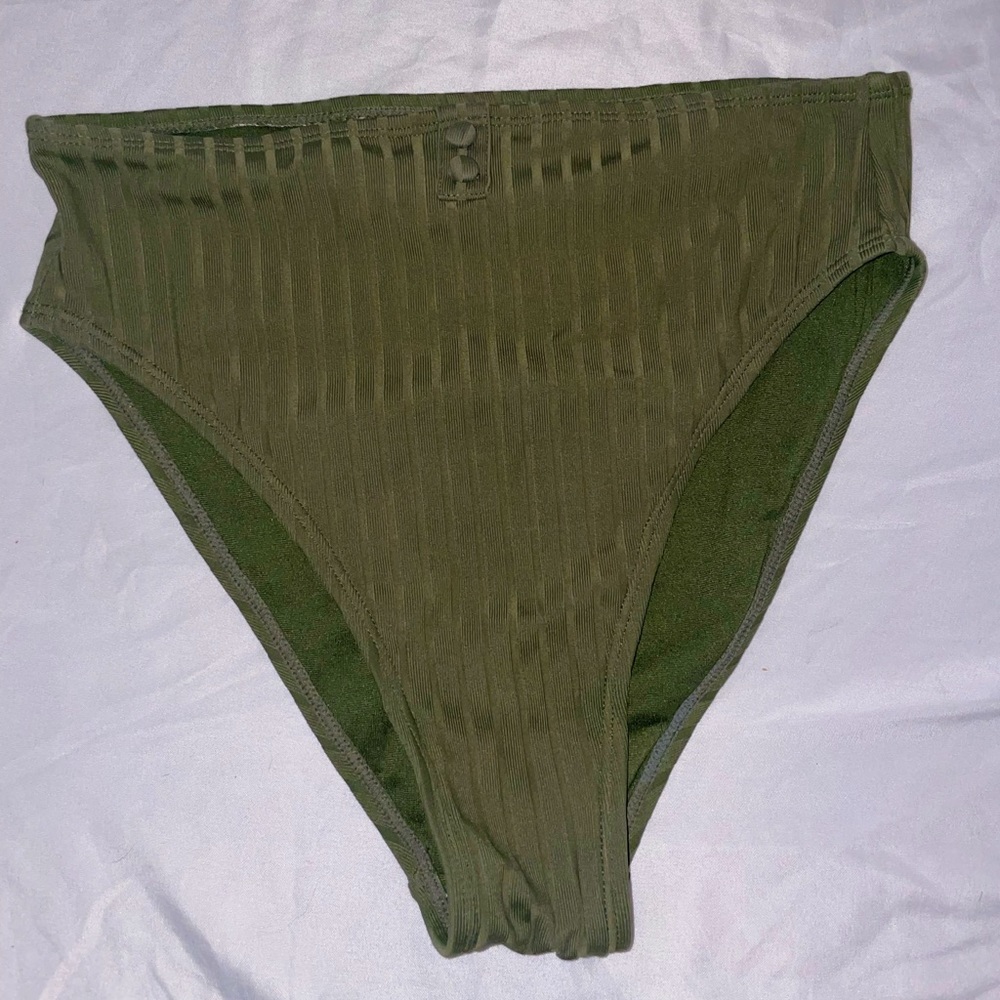 Ripped green swim bottoms